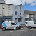 The premises at an address of 33 John Street (centre)