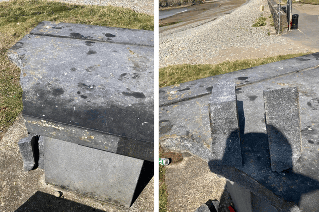 The picnic table at Annestown Beach with a chunk missing