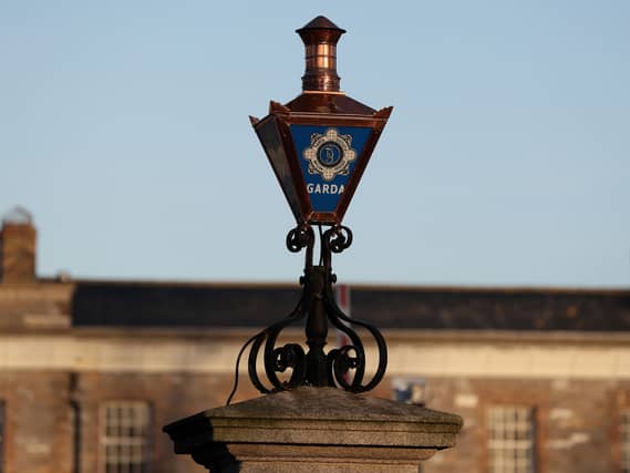 Garda lamp on a building