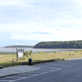 The green area beside Woodstown Beach which is popular with campers