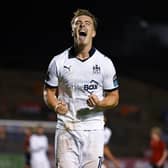 Tommy Lonergan celebrates after doubling the Blues’ lead