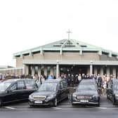 The hearses arriving at the Sacred Heart Parish Church ahead of the Funeral Mass