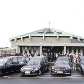 The hearses arriving at the Sacred Heart Parish Church ahead of the Funeral Mass