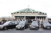 The hearses arriving at the Sacred Heart Parish Church ahead of the Funeral Mass