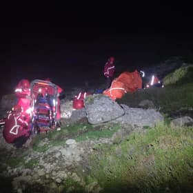 SEMRA volunteers provide assistance to the injured walker