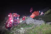 SEMRA volunteers provide assistance to the injured walker