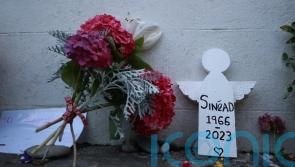 Fans lay tributes and light candles for Sinead O’Connor ahead of funeral