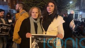 Crowd marches in solidarity with ‘incredibly brave’ Nikita Hand