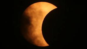 Watch 'the moon take a bite out of the sun' during partial solar eclipse