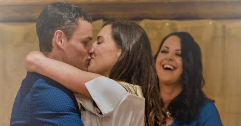 Waterford woman Anne Phelan (back) acted as the celebrant at Rebecca Purcell's and Mark Young's secret wedding