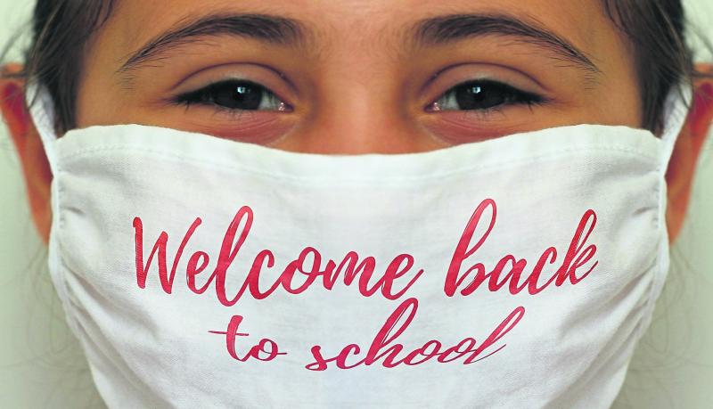 EXPLAINER: How to protect your children from Covid-19 as they head back to school