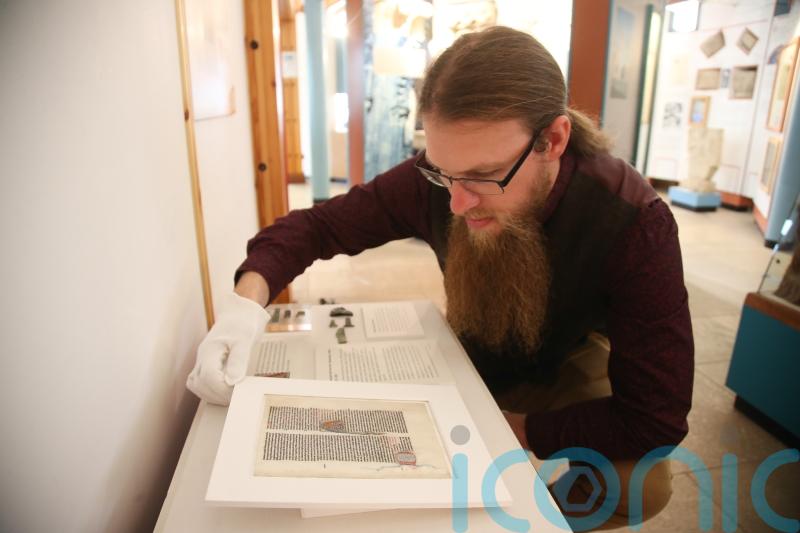 Page from 800-year-old bible goes on display